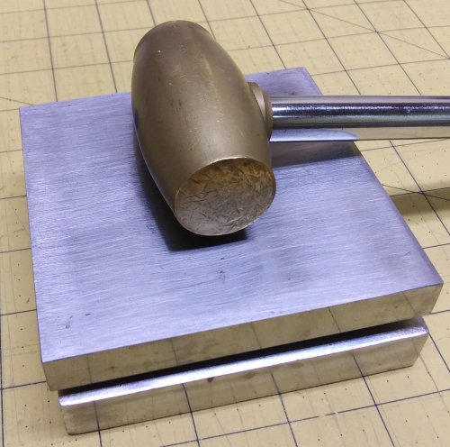 Judy Larson's Make a Lacy Argentium Scrap Metal Sheet - , General Education, Butane Torch, Soldering, Solder, Hammer the top bench block